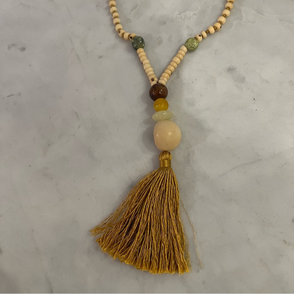 22 inch Pendant with gold fringe tassel.* like new*